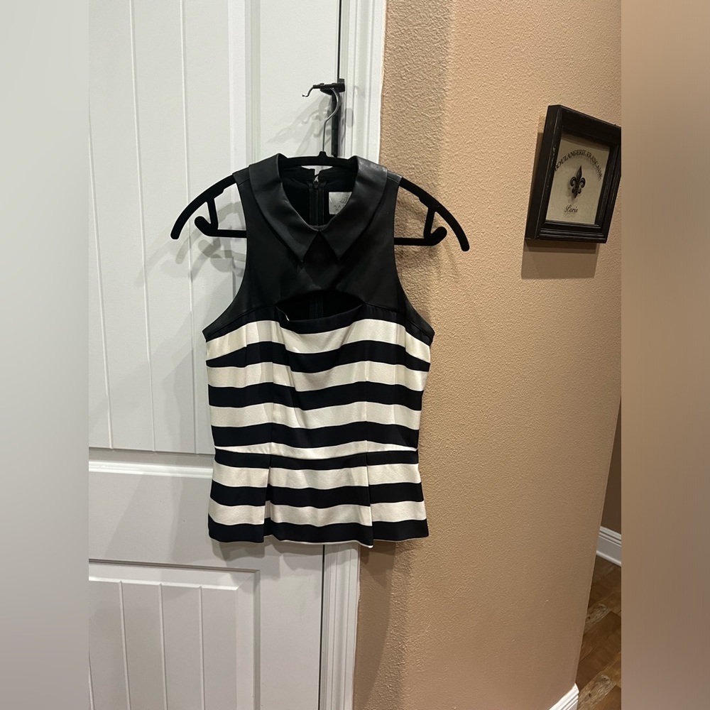 Black and ivory top with faux leather yolk back zip worn once like new